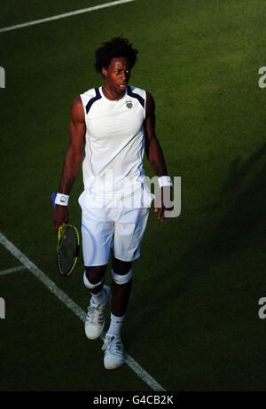 France's Gael Monfils in action during his match against Slovenia's Grega Zemlja during day three of the 2011 Wimbledon Championships at the All England Lawn Tennis and Croquet Club, Wimbledon. Stock Photo