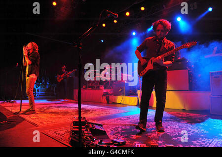 Brandon Boyd and Mike Einziger (right) of Incubus perform of Incubus performs on stage at the HMV Forum in north London. Stock Photo