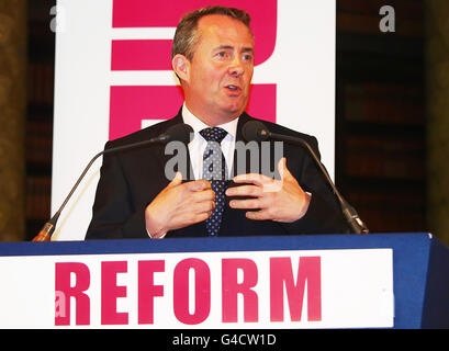 Defence Secretary Liam Fox speaks with Station Commander Group Captain ...