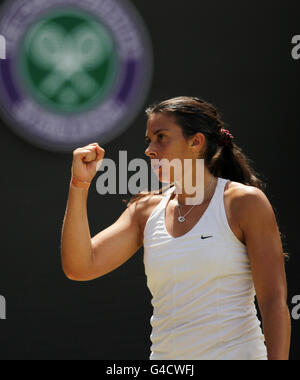 France's Marion Bartoli celebrates against USA's Serena Williams during day seven of the 2011 Wimbledon Championships at the All England Lawn Tennis and Croquet Club, Wimbledon. Stock Photo