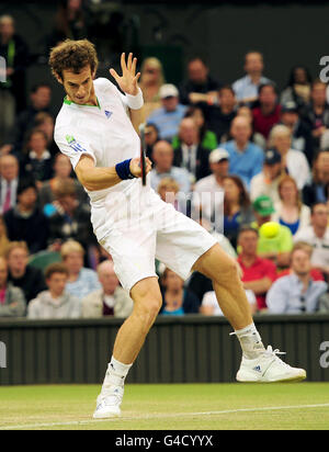 Tennis - 2011 Wimbledon Championships - Day Five - The All England Lawn Tennis and Croquet Club. Great Britain's Andy Murray in action against Croatia's Ivan Ljubicic on Centre Court during day five at the 2011 Wimbledon Championships Stock Photo