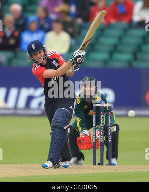 Cricket - Natwest Women's Quadrangular Twenty20 - England v Australia - County Ground. England's Charlotte Edwards hits a four Stock Photo