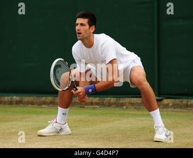 Serbia's Novak Djokovic during a practice session on court 19 during day twelve of the 2011 Wimbledon Championships at the All England Lawn Tennis and Croquet Club, Wimbledon. Stock Photo