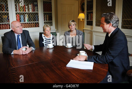 Prime Minister David Cameron meets with the family of murdered school girl Milly Dowler (from left to right) father Bob, mother Sally and sister Gemma, at his office in 10 Downing Street, London. Stock Photo