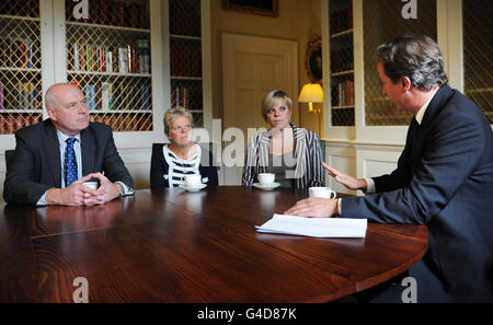 Prime Minister David Cameron meets with the family of murdered school girl Milly Dowler (from left to right) father Bob, mother Sally and sister Gemma, at his office in 10 Downing Street, London. Stock Photo