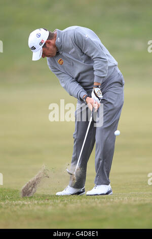 Golf - The Open Championship 2011 - Preview Day Three - Royal St George's. England's Lee Westwood plays off the fairway Stock Photo