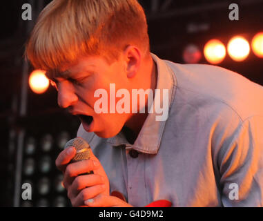 ALTERNATE CROP: The Drums perform on stage at the Lovebox music festival held in Victoria Park, Hackney, London. Stock Photo