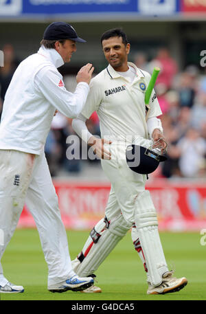 India's Rahul Dravid is congratulated by England's Graeme Swann after scoring 103 not out during day three of the First npower Test at Lord's Cricket Ground, London. Stock Photo