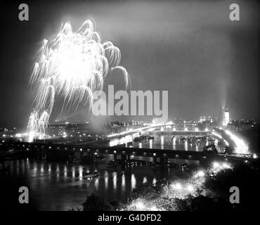 Fireworks light up the sky over the River Thames, London on Coronation day. Stock Photo