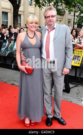 Mark Williams and guest arriving for the world premiere of Harry Potter And The Deathly Hallows: Part 2. Stock Photo