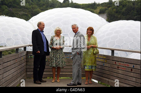 Chief Executive and co-founder of the Eden Project Tim Smit (left) and Managing Director Gaynor Coley speak with the Prince of Wales and Duchess of Cornwall during their visit to the Eden Project in St Austell, Cornwall. Stock Photo