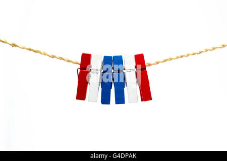Thailand flag pattern clothespins hanging on rope isolated white background Stock Photo