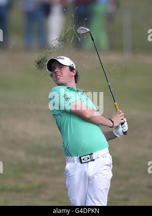 Northern Ireland's Rory McIlroy hits out of the rough during round two of the 2011 Open Championship at Royal St George's, Sandwich. Stock Photo