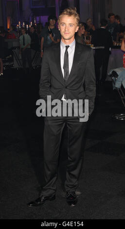 Tom Felton arrives at the after show party for 'Harry Potter and the Deathly Hallows Part Two', at the Old Billingsgate Market, London. Stock Photo