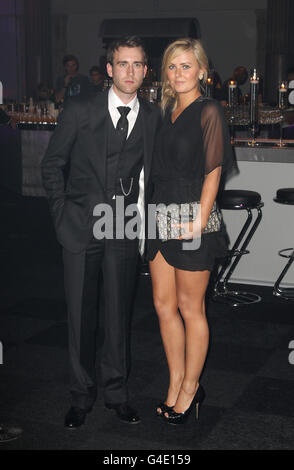 Matt Lewis and guest arrive at the after show party for 'Harry Potter and the Deathly Hallows Part Two', at the Old Billingsgate Market, London. Stock Photo