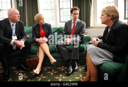 Labour leader Ed Miliband meets with the family of murdered school girl Milly Dowler (from left to right) father Bob, sister Gemma and mother Sally, at his office in Westminster, London. Stock Photo