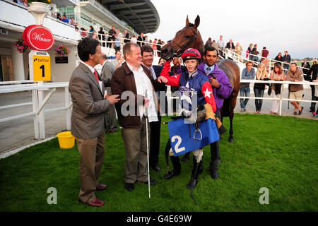 Trainer Andrew Balding (right) after seeing horse Humidity ridden by