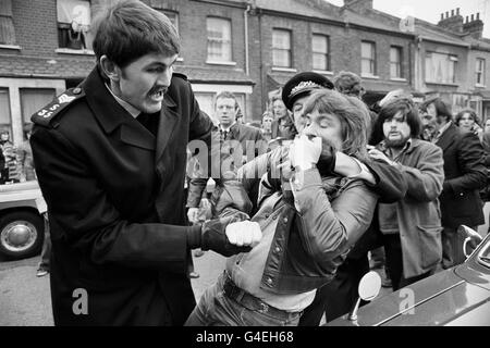 Police restraining pickets outside the Grunwick Processing Laboratories at Willesden, London, who are supporting an official strike by process workers. Stock Photo