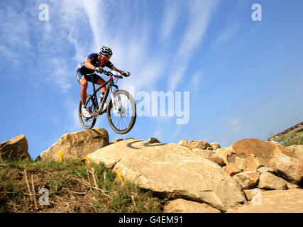 France's Julien Absalon on his way to winning the Men's Cross Country Mountain Bike Race during the Cycling-Mountain Biking London 2012 Olympic Test Event at Hadleigh Farm, Benfleet. Stock Photo