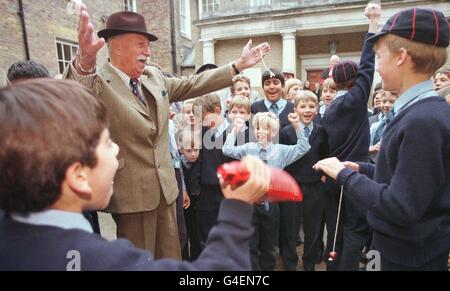 Major Jim Cowley OBE, DCM shows his horror at losing the final round of a conker contest to Robert Sheridan III (aged 13) at St George's School in Windsor Wednesday October 7, 1998. The major was part of the Military Knights of Windsor Castle team playing the local school boys in the annual contest which the boys won 7-2. The Military Knights of Windsor are former servicemen who live in Windsor Castle and who take part in the Garter Ceremony and other occasions. PA photo: John Stillwell Stock Photo