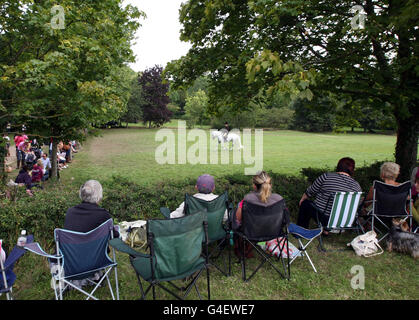 Equestrian - 2011 Longines Royal International Horse Show - Day One - The All England Jumping Course - Hickstead. Spectators watch a showing class during the Longines Royal Hickstead International Horse Show at The All England Jumping Course, Hickstead. Stock Photo