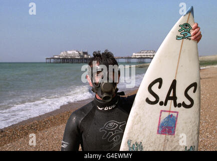 Chris Hines from St Agnes, General Secretary of Surfers Against Sewage makes his protest by wearing a gas mask in the sea at Brighton today (Wednesday) on the third day of the Liberal democrat conference. Stock Photo