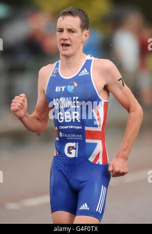 Great Britain's Alistair Brownlee during the running stage of the Dextro Energy Triathlon ITU World Championship Series in Hyde Park, London. Stock Photo