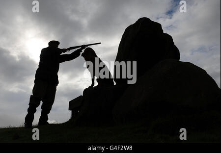 Richard Wolfden, a moorland gamekeeper for the forest of Bowland on the North Yorkshire and Lancashire border, shooting on the Glorious 12th, which traditionally signals the start of the grouse shooting season. Stock Photo