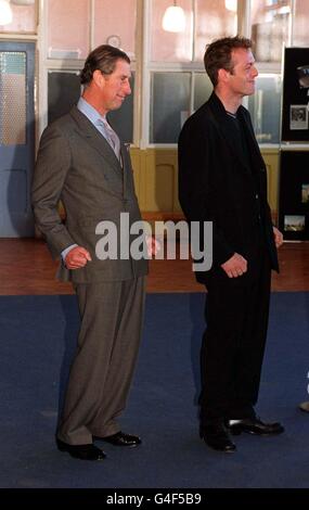 The Prince of Wales and Full Monty heart throb Hugo Speer dance the 'JobCentre' scene from the British hit film during the Prince's visit to Sheffield today (Friday) on the eve of his 50th birthday. WPA ROTA photo by John Stillwell/PA. See PA story ROYAL Prince Stock Photo