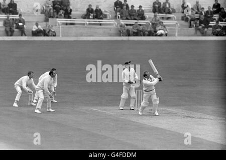 Cricket - County Championship 1970 - Kent v Warwickshire - Day One - Bat and Ball Ground, Gravesend. Neal Abberley in batting action for Warwickshire on his way to making 19 runs. The wicketkeeper for Kent is Alan Knott. Stock Photo