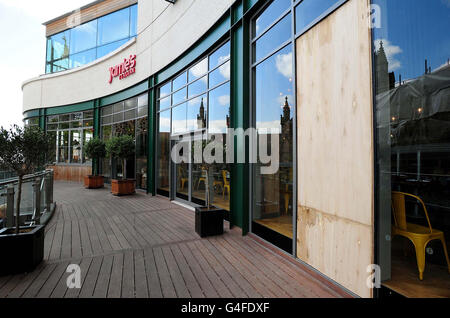A general view of damage to the Jamie's Italian restaurant in the Bullring shopping centre in Birmingham, after rioting in the area last night. Stock Photo