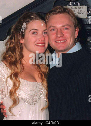 Actress Kate Winslet and new husband Jim Threapleton at their wedding reception in the Crooked Billet pub in Stoke Row, Oxfordshire. * 3/9/01: Movie star Winslet and husband Threapleton are separating, the actress's spokesman. Winslet's spokesman Robert Garlock told PA News Kate Winslet and Jim Threapleton announced that they have decided to separate. No other parties are involved in this amicable and respectful separation. Their daughter Mia will remain first priority for both of them. Stock Photo