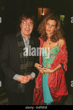 PA NEWS PHOTO 1/12/98 FORMER MEMBER OF THE ROLLING STONES BILL WYMAN AND HIS WIFE SUZANNE ARRIVING FOR THE TATLER CHRISTMAS PARTY AT MARCO PIERRE WHITE'S 'TITANIC' BAR/RESTAURANT IN LONDON. Stock Photo