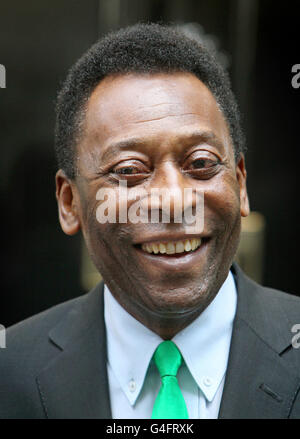 Brazilian footballer Pele arrives at 10 Downing Street, in Westminster, central London, where he donated a football shirt to Prime Minister David Cameron and met children involved with the Street League football charity. Stock Photo