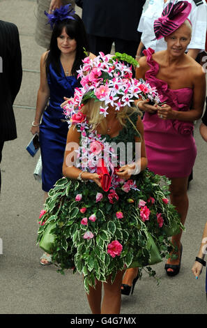 Horse Racing - Ebor Festival 2011 - Darley Yorkshire Oaks & Ladies Day - York Racecourse. This unusual floral outfit proved to be a head turner in the large crowd during the Ebor Festival 2011 at York Racecourse. Stock Photo