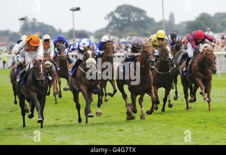 Horse Racing - Ebor Festival 2011 - Darley Yorkshire Oaks & Ladies Day - York Racecourse. Navajo Chief ridden by Harry Bentley(left) win the Addleshaw Goddard Stakes during the Ebor Festival 2011 at York Racecourse. Stock Photo