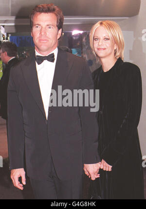 Actress Meg Ryan accompanied by her husband Dennis Quaid arriving for the Royal Film Performance of 'The Parent Trap' in aid of the Cinema and Television Benevolent Fund. See PA Story ROYAL Film. Photo by Toby Melville/PA Stock Photo