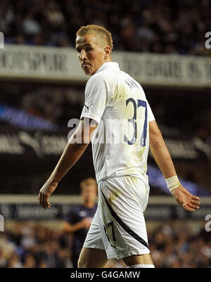 Tottenham Hotspur's Harry Kane looks back dejected after his penalty was saved by Heart of Midlothian goalkeeper Jamie MacDonald during the UEFA Europa League, Play Offs, Second Leg match at White Hart Lane, London. Stock Photo