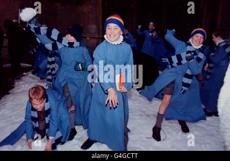 Choristers from Wells Cathedral School play on the specially-made PolarSnow at the Cathedral today (Tuesday). The snow was made by industrial gases company Air Products after the cathedral choir appealed for help with the cover picture for their next CD. Master of the Choristers Malcolm Archer wanted the picture to show choir boys hurling snowballs with the historic building in the background. See PA story SOCIAL/Snow. Photo Barry Stock Photo