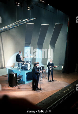 PA NEWS PHOTO 7/12/63 'THE BEATLES' PERFORMING ON STAGE IN LIVERPOOL Stock Photo