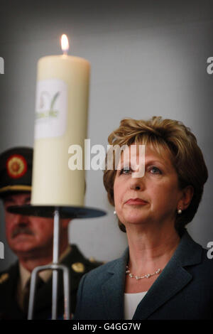 Irish President Mary McAleese gwith the candle of hope in the grounds of Kilmainham Hospital during the conference held by Console on suicide. Stock Photo