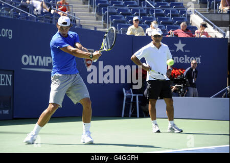 Tennis - 2011 US Open - Day Twelve - Flushing Meadows. Spain's Rafael Nadal practices with his coach Toni Nadal during day twelve of the US Open at Flushing Meadows, New York, USA. Stock Photo