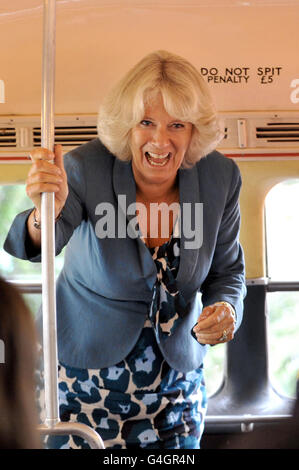 The Duchess of Cornwall travels on a double decker as part of a tour of urban gardens. Stock Photo