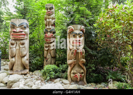 Totem Poles on display at the Capilano suspension Bridge park in Vancouver, British Columbia Stock Photo