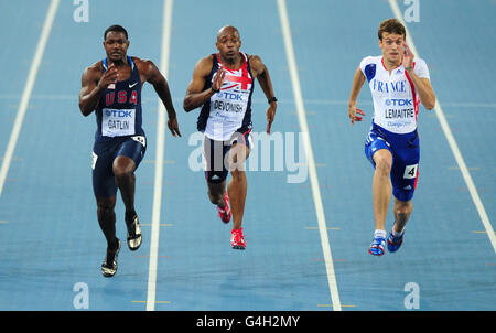 Great Britain's Marlon Devonish (c) during his 100m heat with USA's Justin Gatlin (l) and France's Christophe Lemaitre Stock Photo