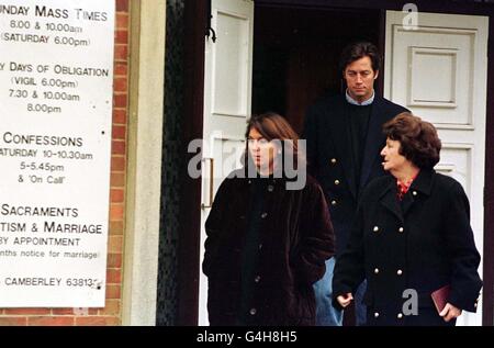 Pinochet relations leave church Stock Photo