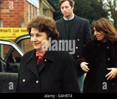 Pinochet relations leave church 2 Stock Photo