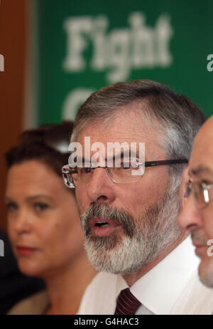 Sinn Fein's (left - right) Mary Lou McDonald TD, Leader Gerry Adams and Caoimhghin O Caolain speak to the media at the Shelbourne Hotel in Dublin as Sinn Fein's team in the Dail and Seanad meet in advance of the resumption of the Dail term. Stock Photo