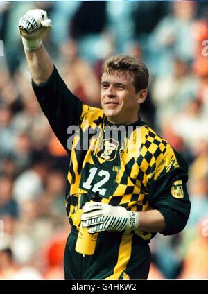 Scotland goalkeeper Andy Goram celebrates after his team equalise Stock ...