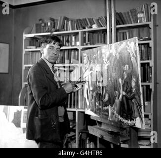 British artist Stanley Spencer at work in his studio in Cookham, on one of his resurrection paintings for the oratory in the village of Burghclere, Hampshire. Stock Photo